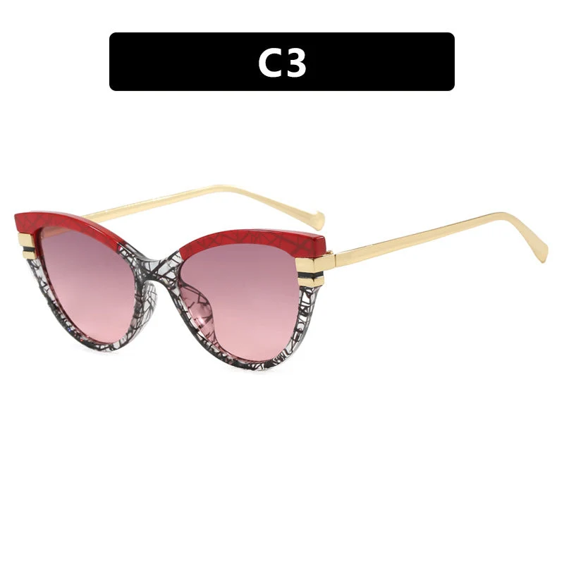 Dame Cat-Eye solbriller med elegant plastramme og gullaccentuer Luvikno