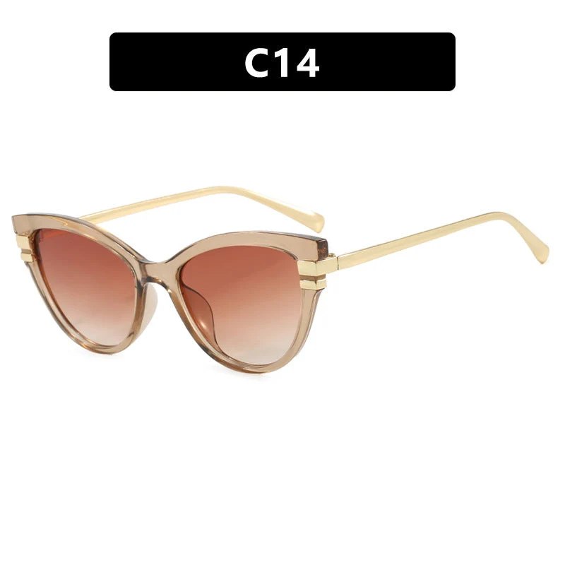 Dame Cat-Eye solbriller med elegant plastramme og gullaccentuer Luvikno