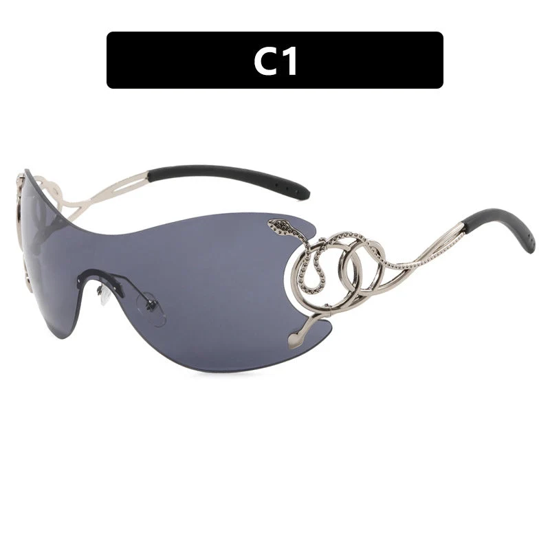 Dame futuristisk solbrille med lekent design Luvikno