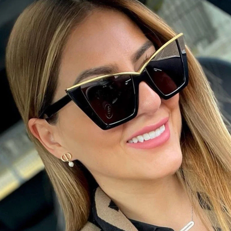 Dame ekstravagant solbrille med unik design og gullige aksenter Luvikno