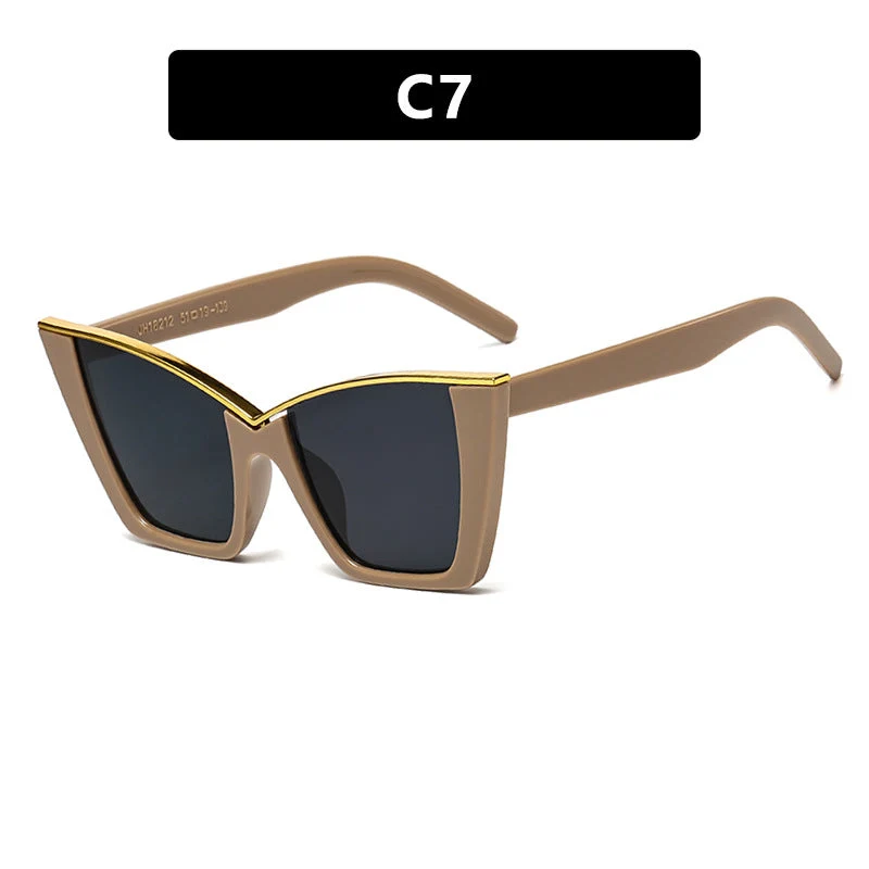 Dame ekstravagant solbrille med unik design og gullige aksenter Luvikno