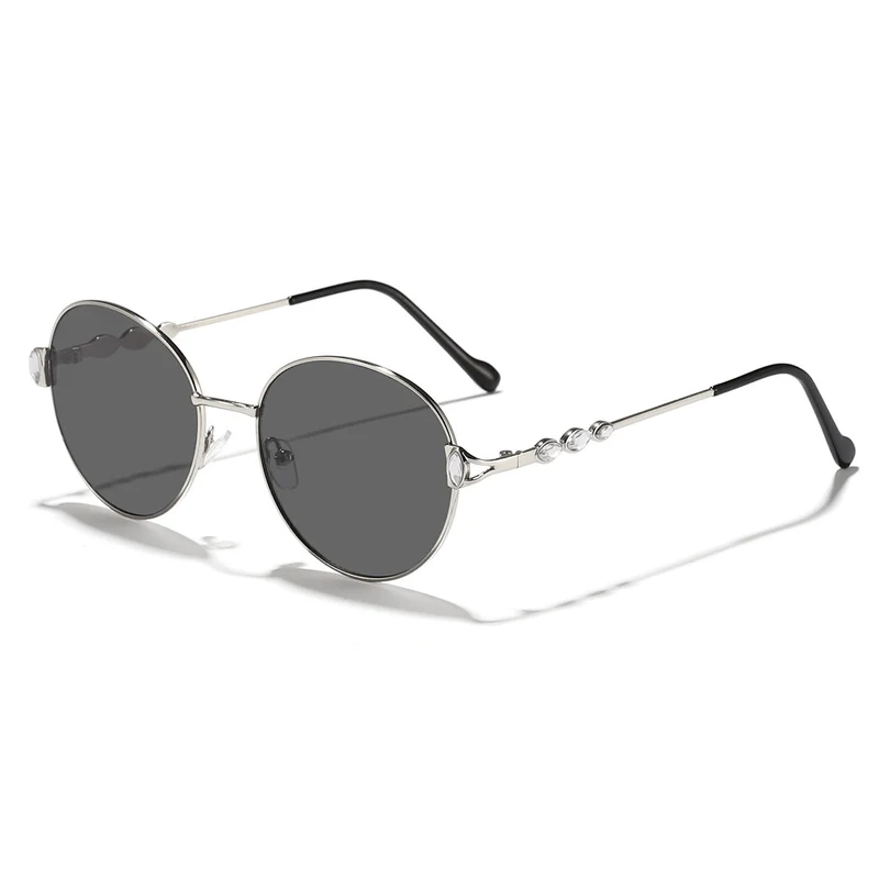 Dame rund solbrille med elegant metallramme og speilvendte glass Luvikno
