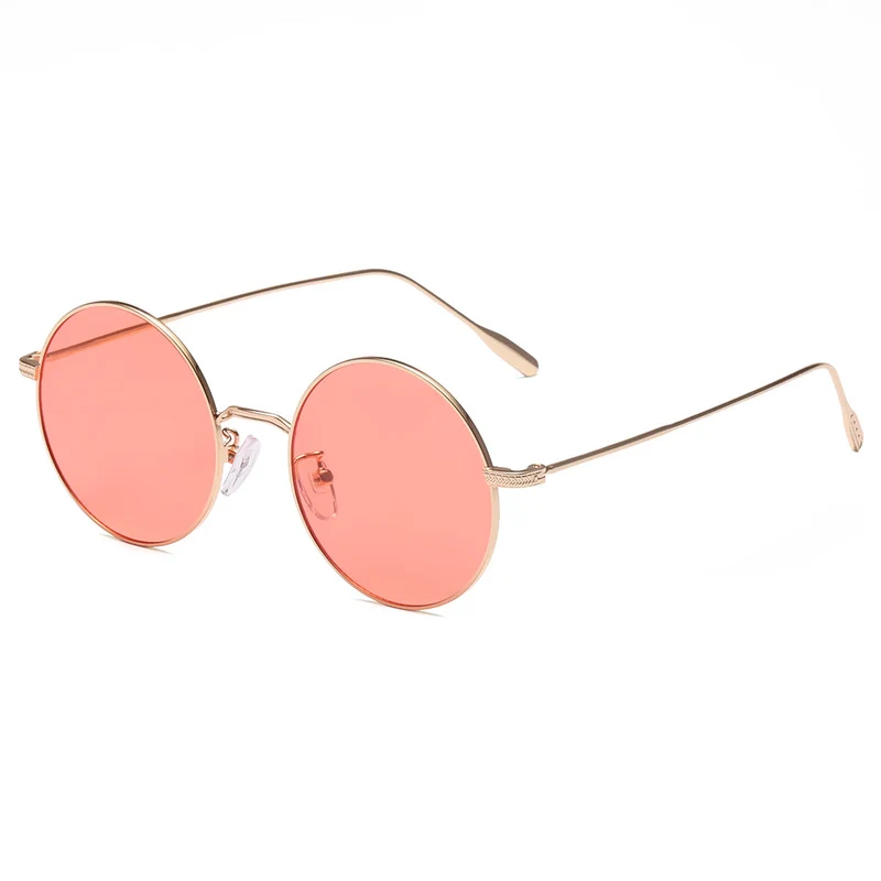 Dame rund solbrille med elegant metallramme og polarisert glass Luvikno