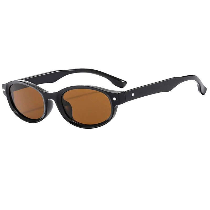 Dame moteriktig solbrille med elegant ramme Luvikno