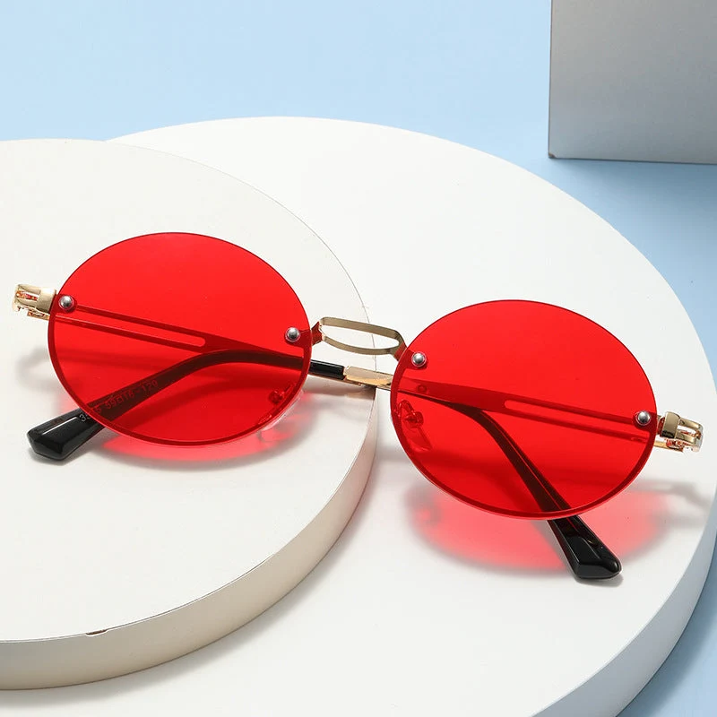Dame rund solbrille med fin metallramme Luvikno