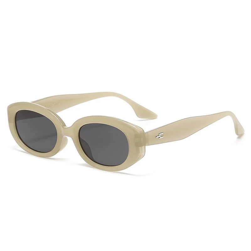 Dame moteriktig solbrille med moderne, oval ramme Luvikno