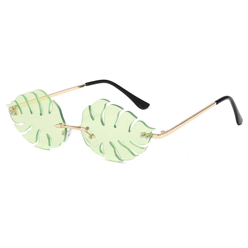 Dama moteriktig solbrille med markant bladerdesign Luvikno