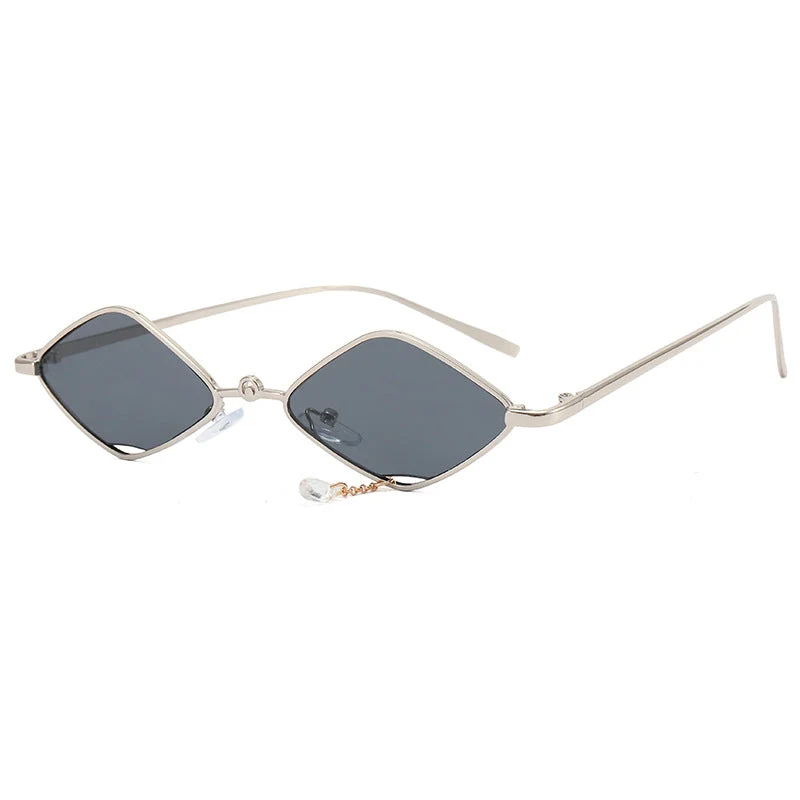Dame moteriktig solbrille med fasettert ramme Luvikno