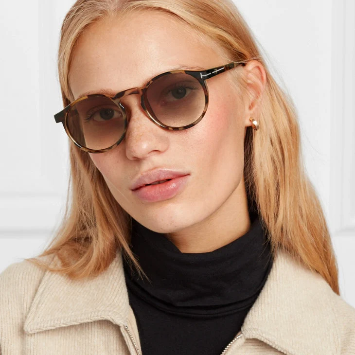 Dame moterik rund solbrille med elegant plastramme Luvikno