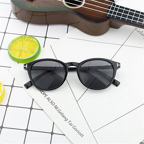 Dame moterik rund solbrille med elegant plastramme Luvikno