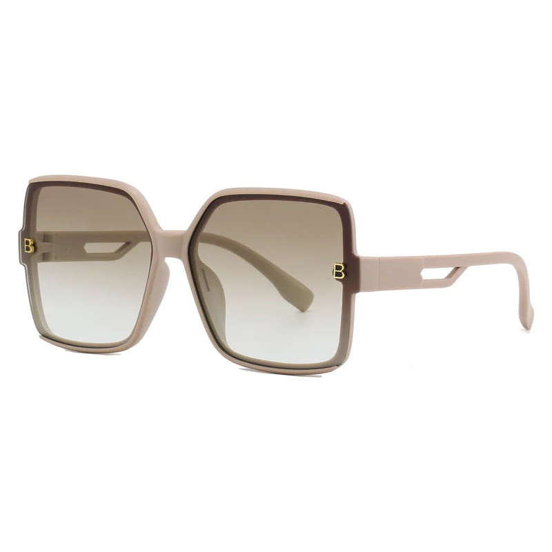 Dame moteriktig oversized solbrille med ekstravagante aksenter Luvikno