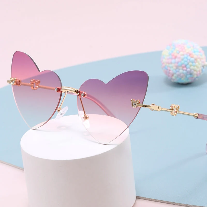 Damer hjerteformet solbrille med dekorert ramme Luvikno