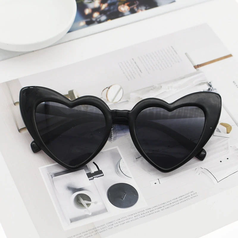 Dame hjerteformet solbrille med glitrende ramme Luvikno