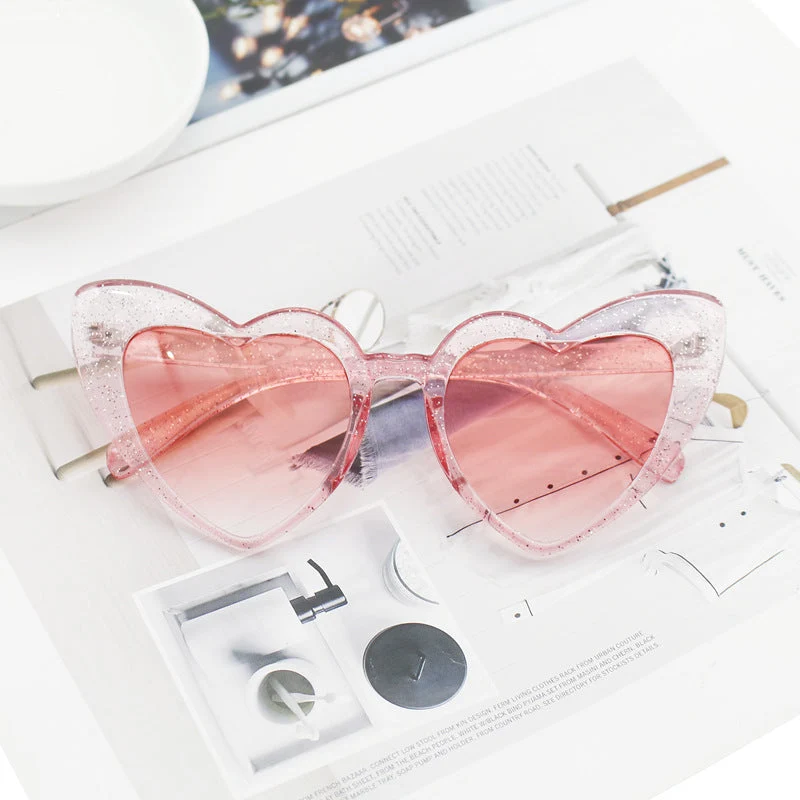 Dame hjerteformet solbrille med glitrende ramme Luvikno