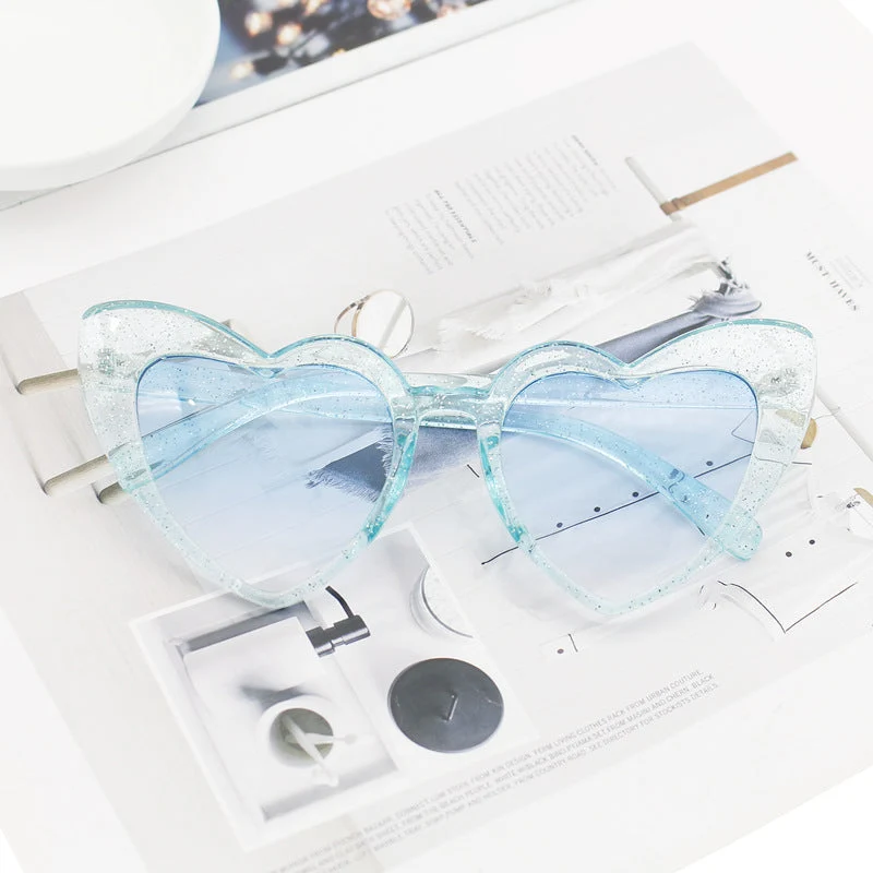 Dame hjerteformet solbrille med glitrende ramme Luvikno