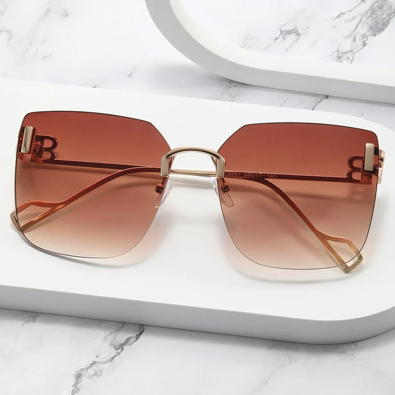 Dame elegant firkantet solbrille med gullfarget metalramme Luvikno