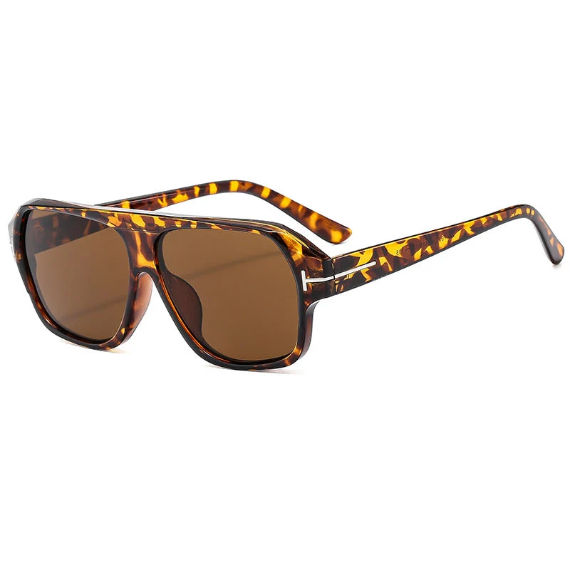 Dame modische solbrille med markant geometri og brune glass Luvikno