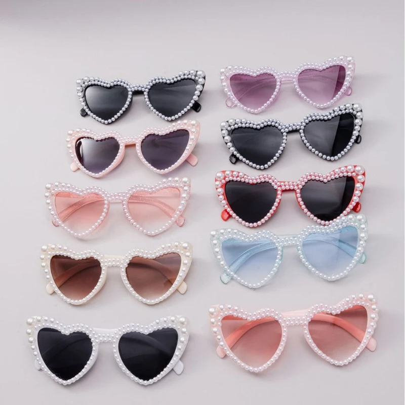 Dame designer solbrille med perleinnramming fra Luvikno