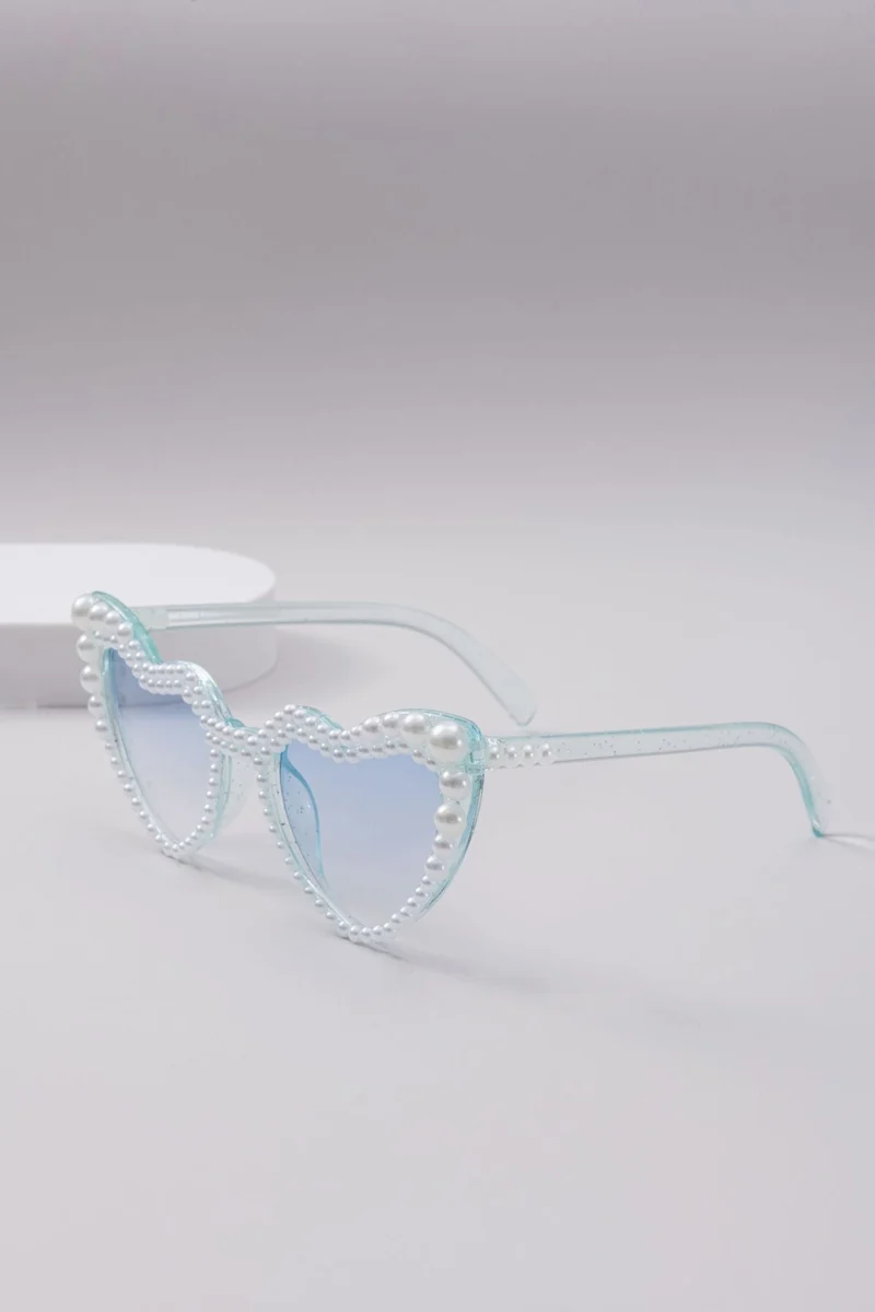 Dame designer solbrille med perleinnramming fra Luvikno