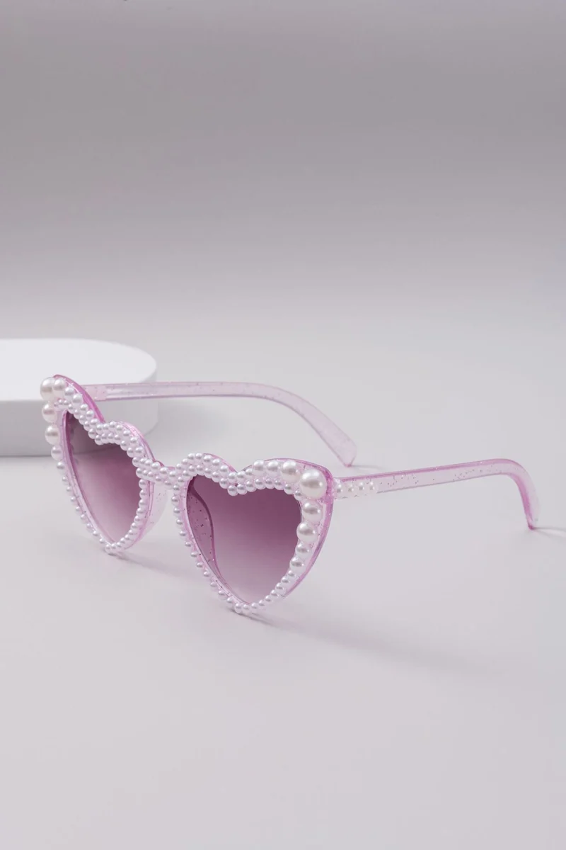 Dame designer solbrille med perleinnramming fra Luvikno