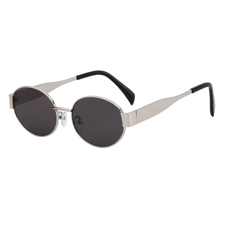Dame moteriktig solbrille i elegant oval design Luvikno