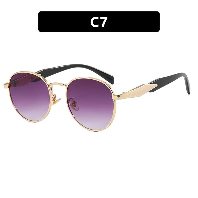 Dame rund solbrille med elegant, gullramme og UV-beskyttelse Luvikno