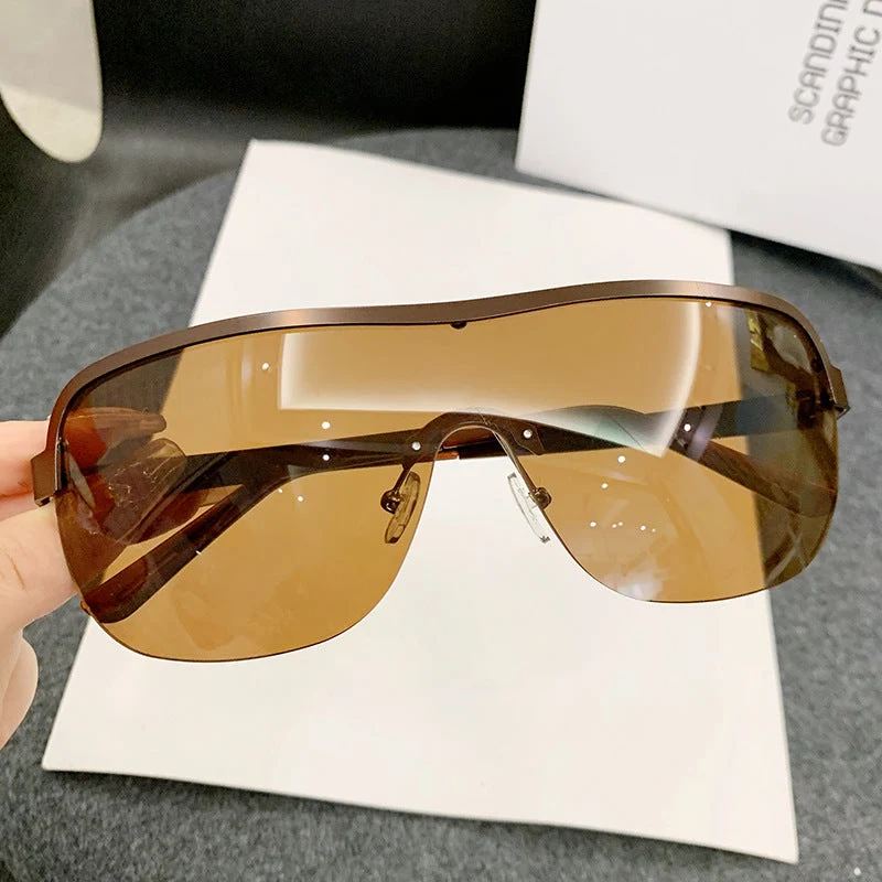 Dame futuristisk solbrille med elegant minimalistisk design Luvikno