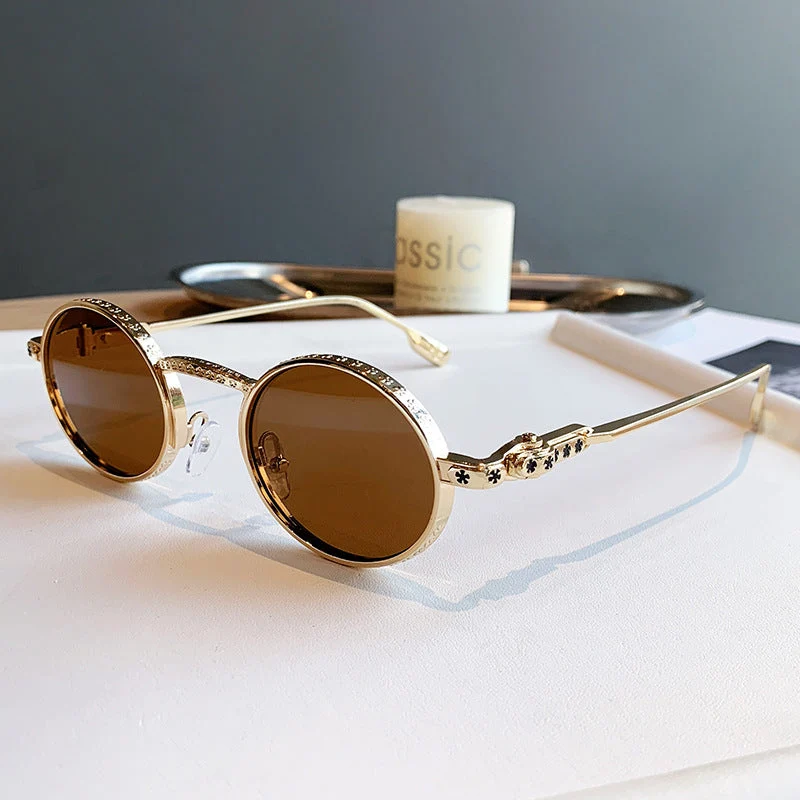 Dame Elegant solbrille med filigran detaljer Luvikno