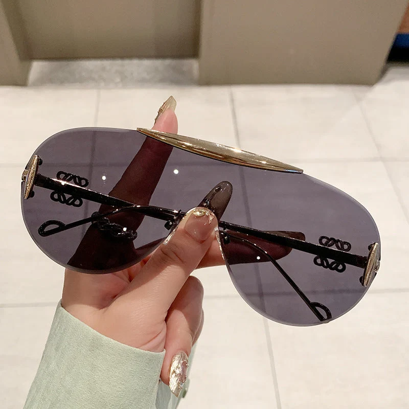 Damer elegant oversized solbriller med stilfull transparent ramme Luvikno