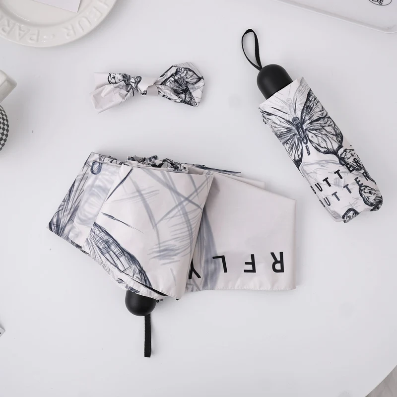 Dame fashionable foldeparaply med leken design Luvikno