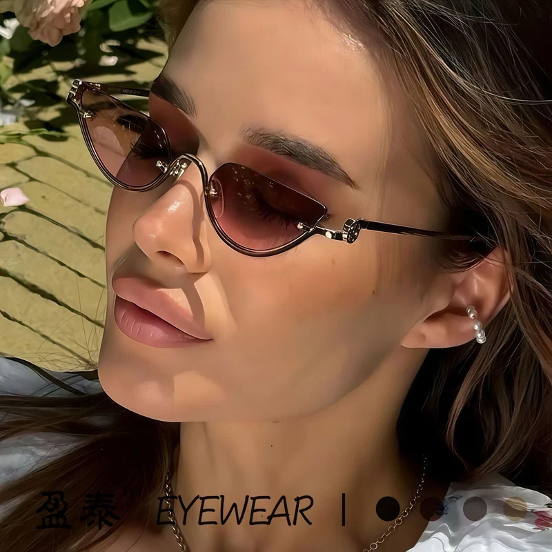 Dame cat-eye solbrille med filigran gullramme Luvikno