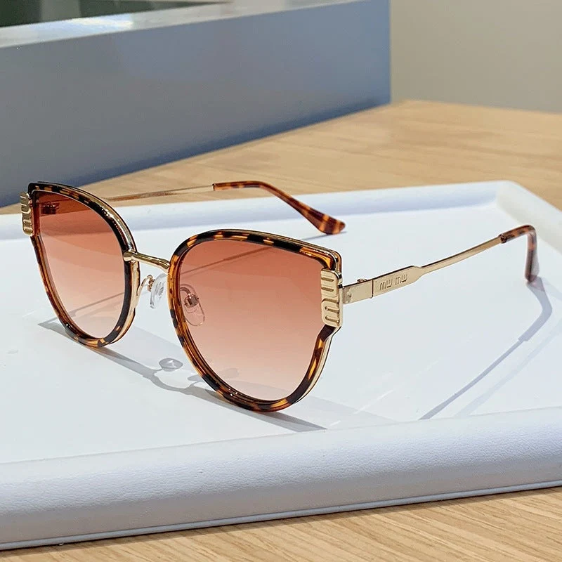 Damer Cat-Eye solbriller med elegante fremhevede linser Luvikno