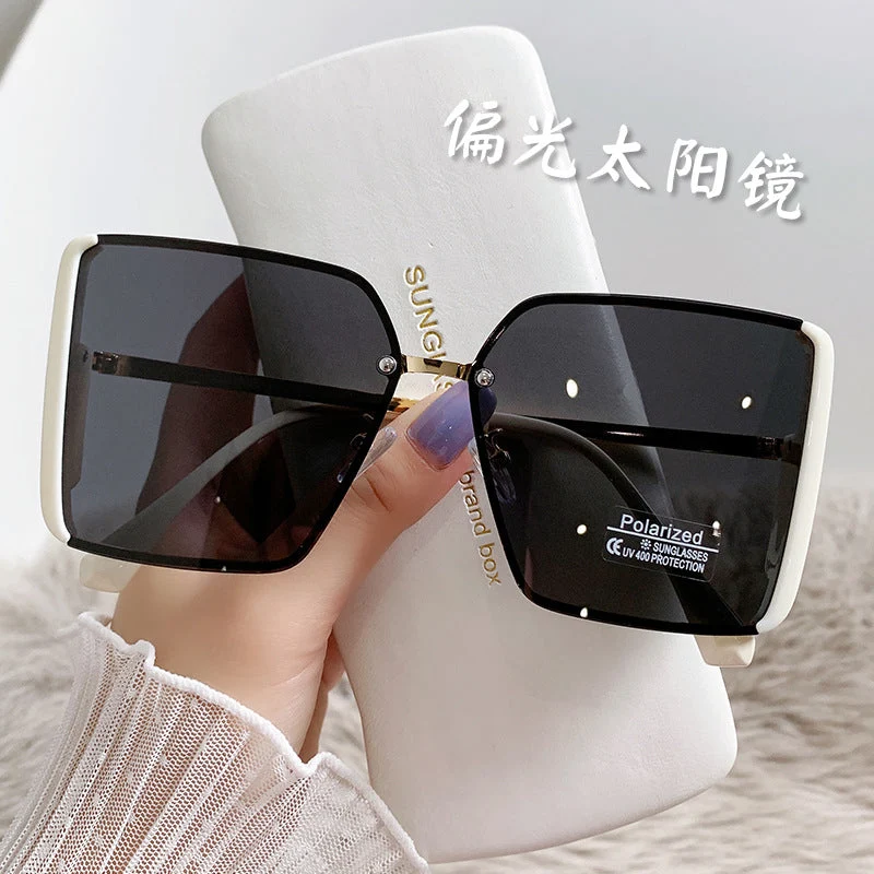 Kvinne polaroid solbriller med elegant oversized ramme Luvikno