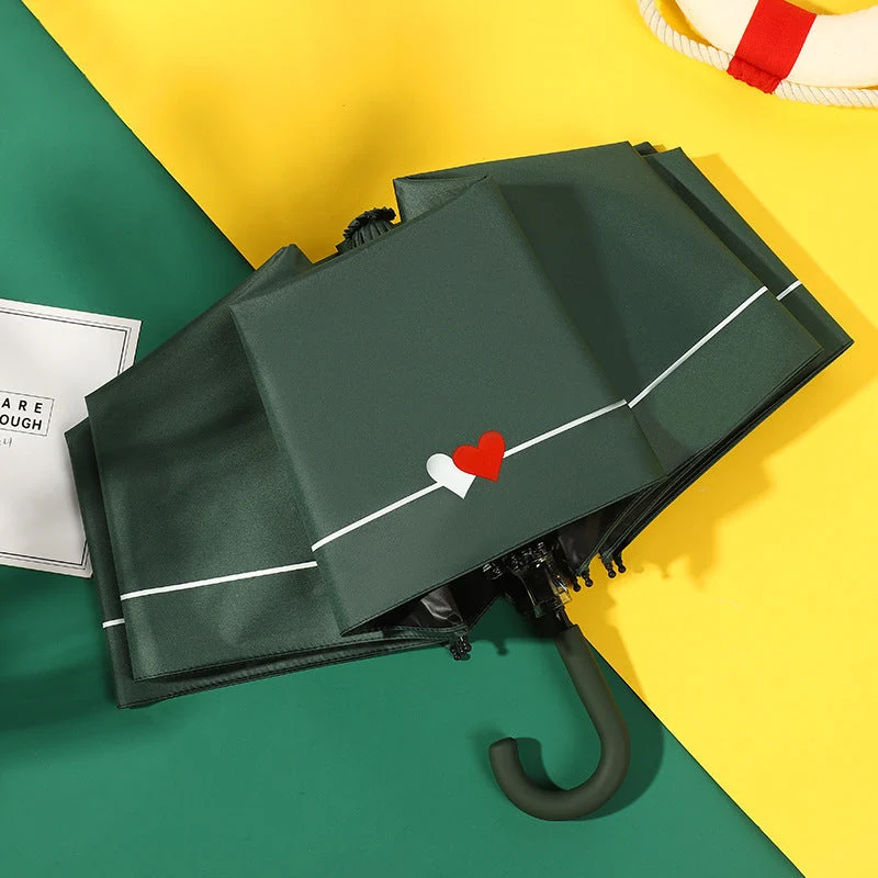 Dame kompakt sammenleggbart regnparaply med elegant design og ergonomisk tremanor Luvikno