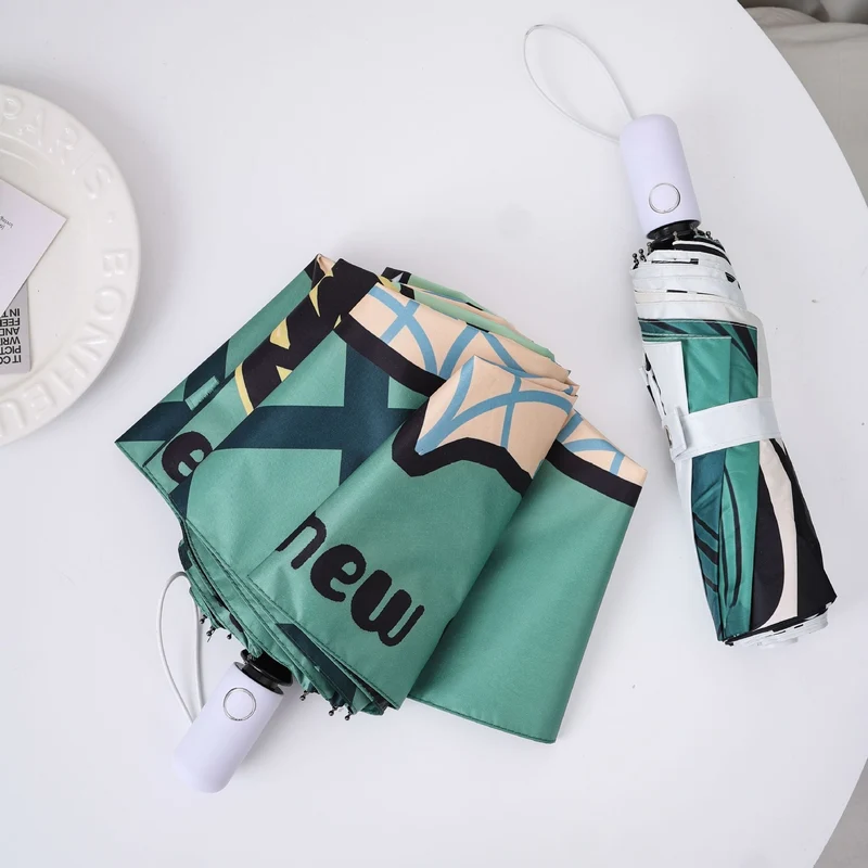 Damer innovativ foldbar paraply med unikt grafisk design Luvikno