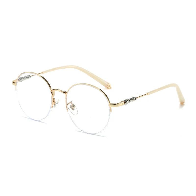 Dame rund solbrille med elegant metallramme og komfortable nesepads Luvikno