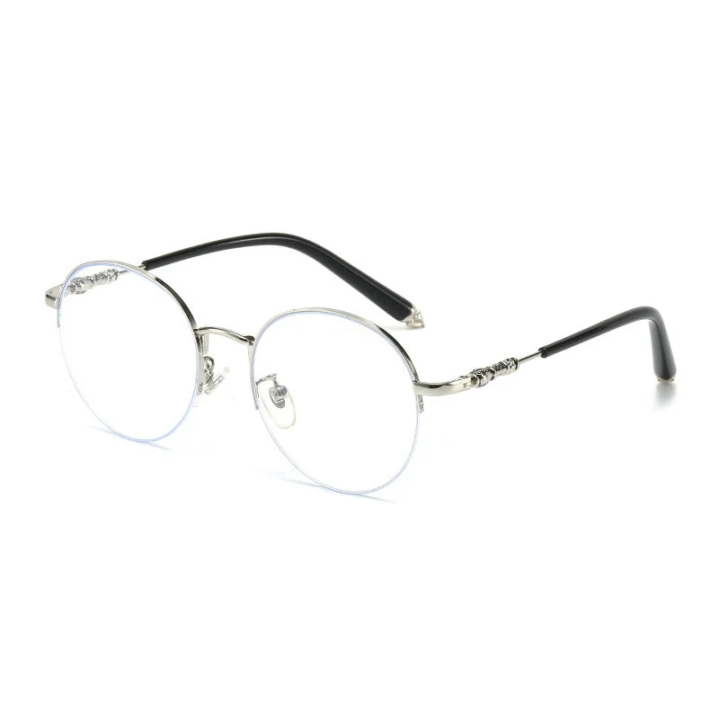 Dame rund solbrille med elegant metallramme og komfortable nesepads Luvikno