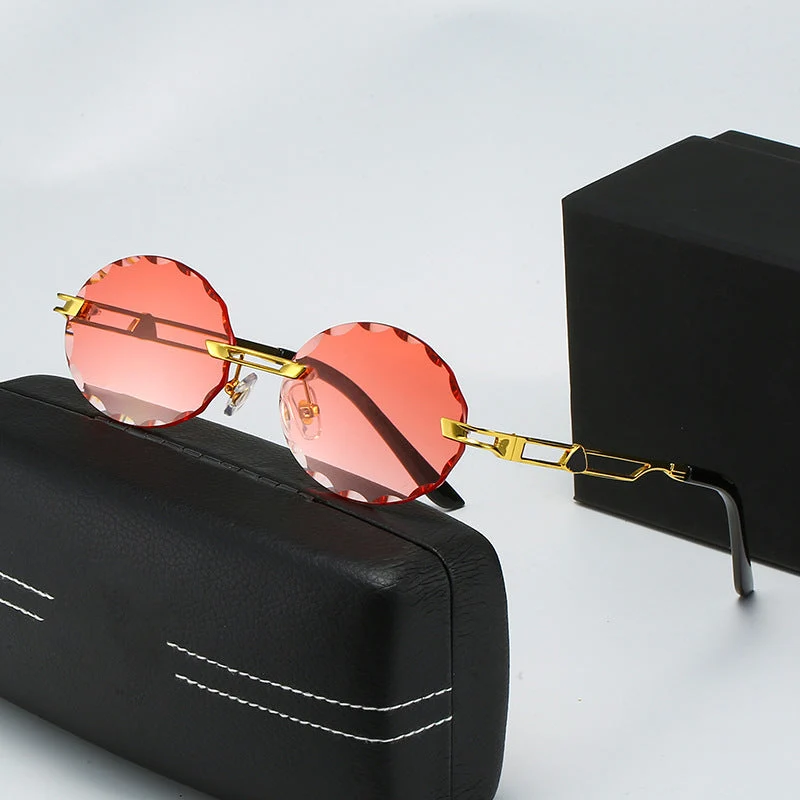 Dame rund solbrille med unikt bølgedesign og høykvalitets metallramme Luvikno