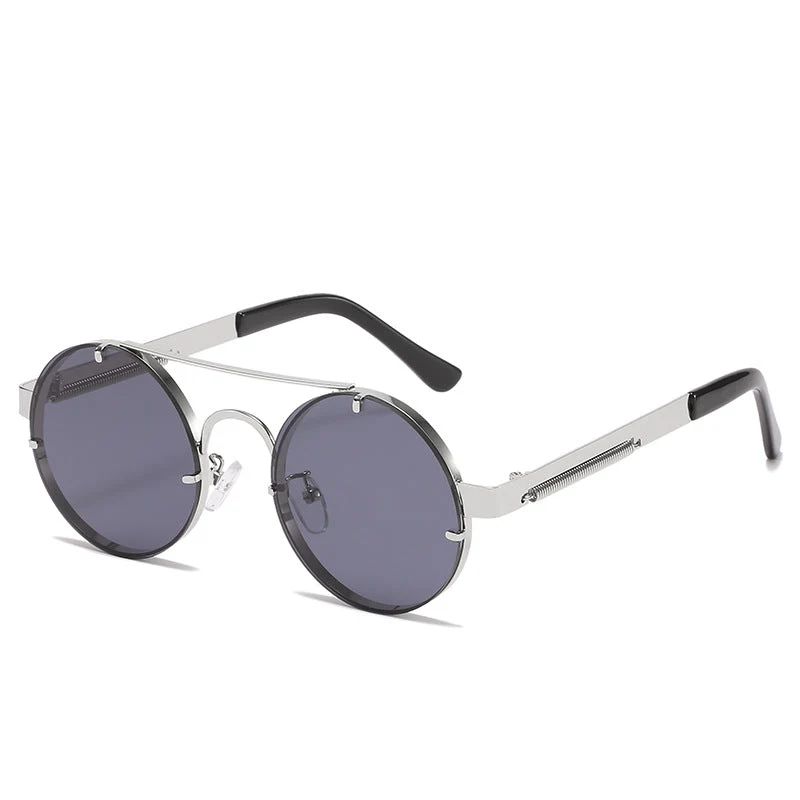 Dame rund designer solbrille med innovativ metallramme og beskyttende linser Luvikno