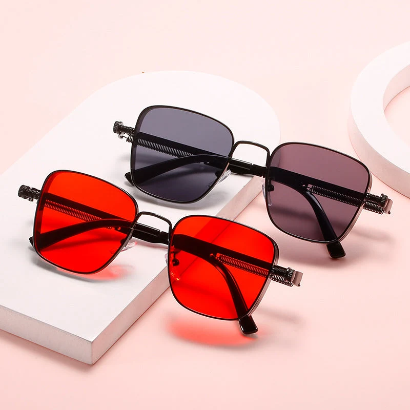 Dame modernistisk solbrille i elegant metallramme Luvikno