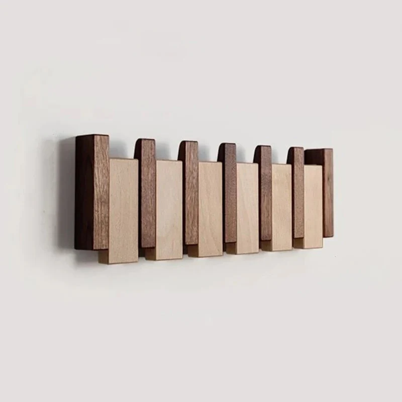 Tre vegghenger i piano design med sammenleggbare kroker | Luvikno