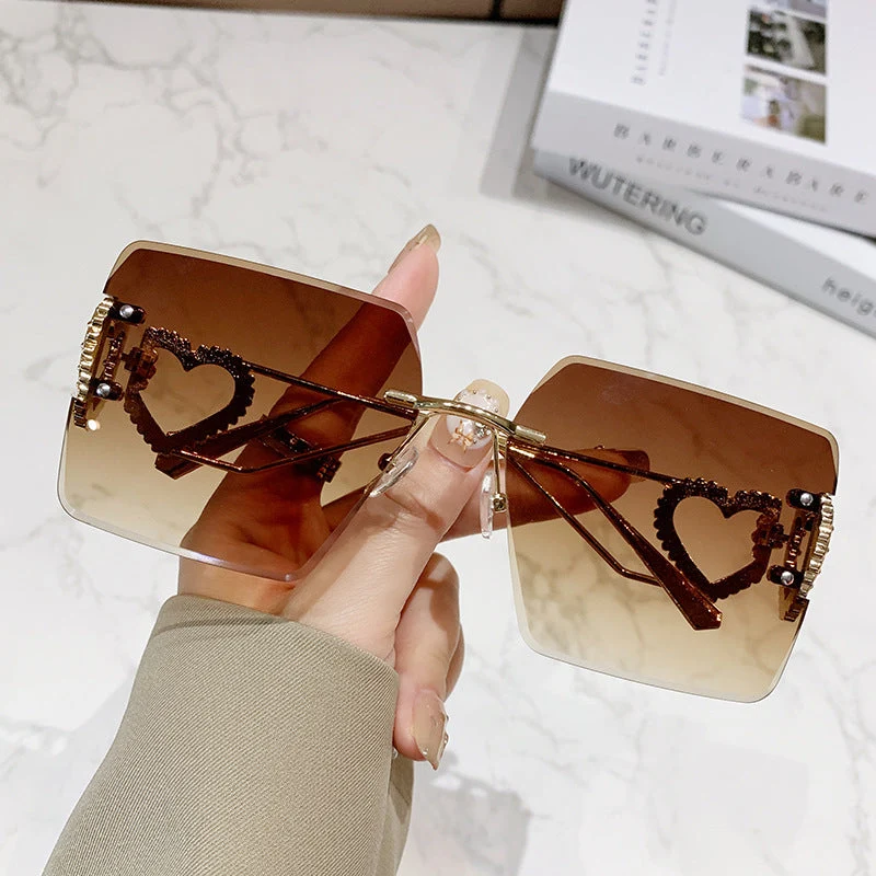 Dame moteriktig solbrille med trendy hjerte-design Luvikno