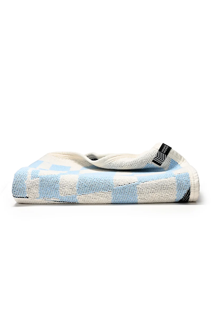 Cotton Beach Towel / Mini Blanket “Cosmic Man” by Raphael Greaves