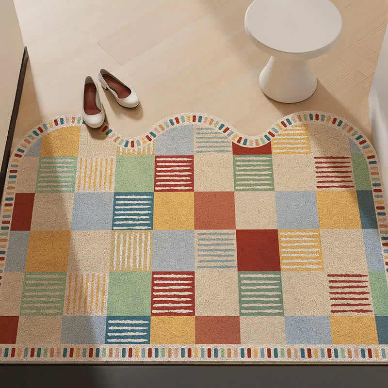Eingangsteppich mit farblich abgesetztem Patchwork-Muster