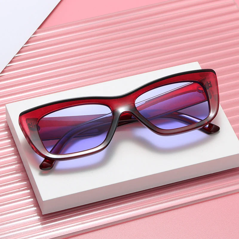 Dame moteriktig solbrille med rektangulært ramme Luvikno