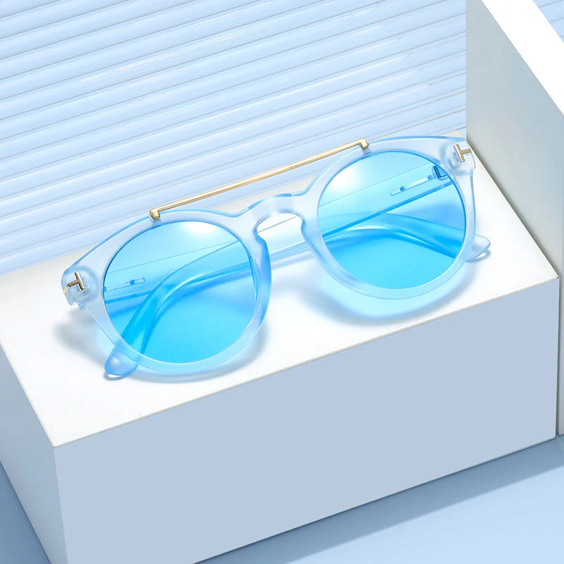 Dame fashionable solbriller med elegante runde glass Luvikno