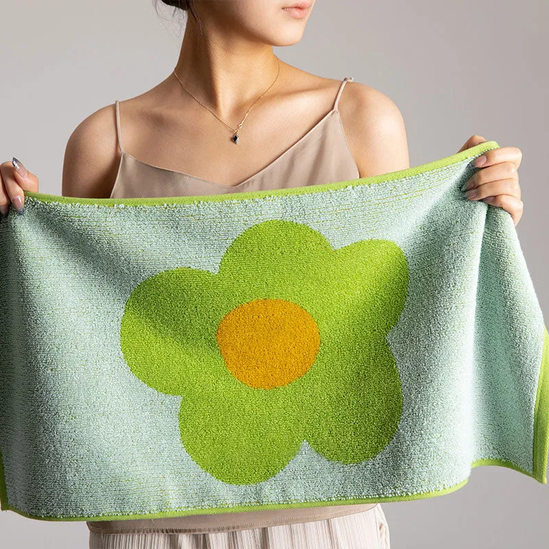 Atmungsaktives Baumwollhandtuch mit Blumenmuster und Farbblockdesign