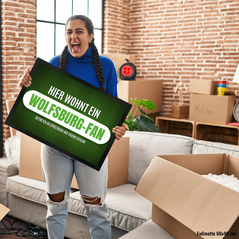 Hier wohnt ein Wolfsburg-Fan Fußmatte mit Rasen Motiv