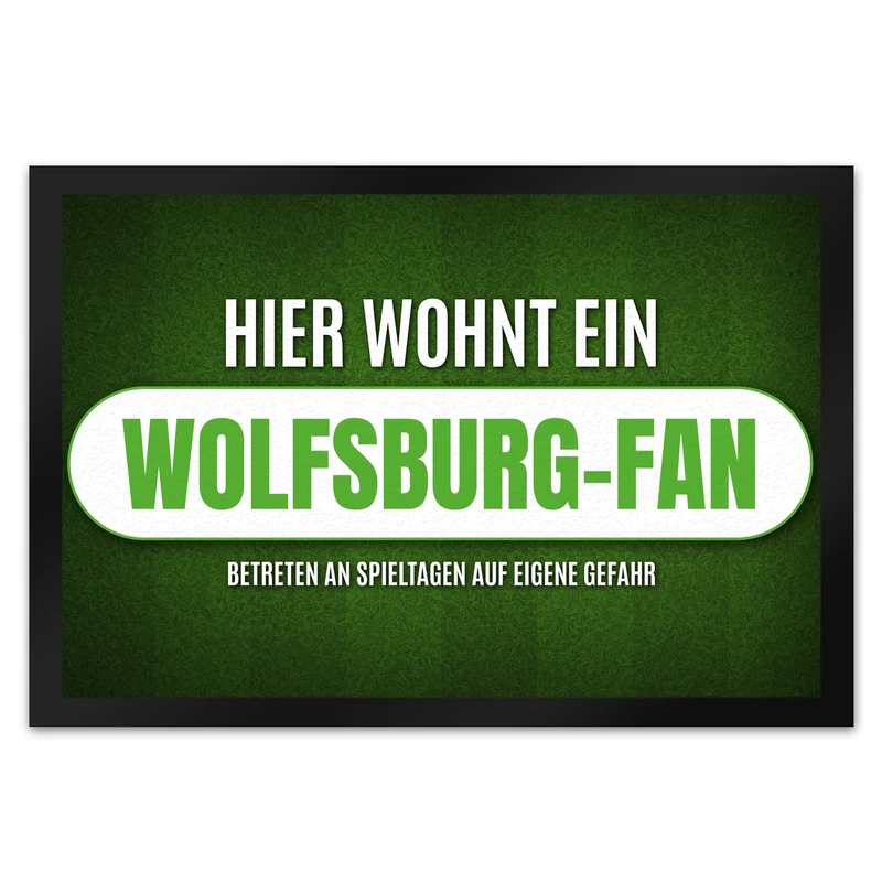 Hier wohnt ein Wolfsburg-Fan Fußmatte mit Rasen Motiv