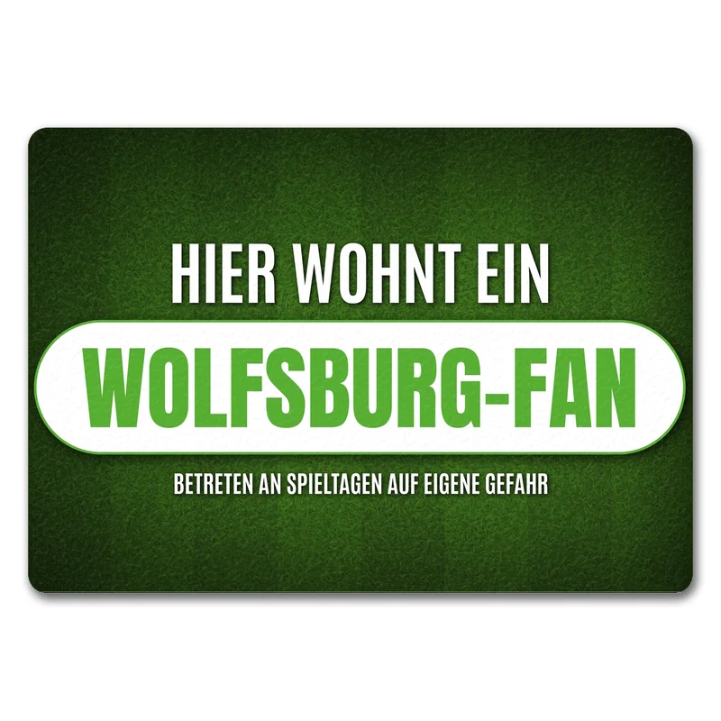 Hier wohnt ein Wolfsburg-Fan Fußmatte mit Rasen Motiv